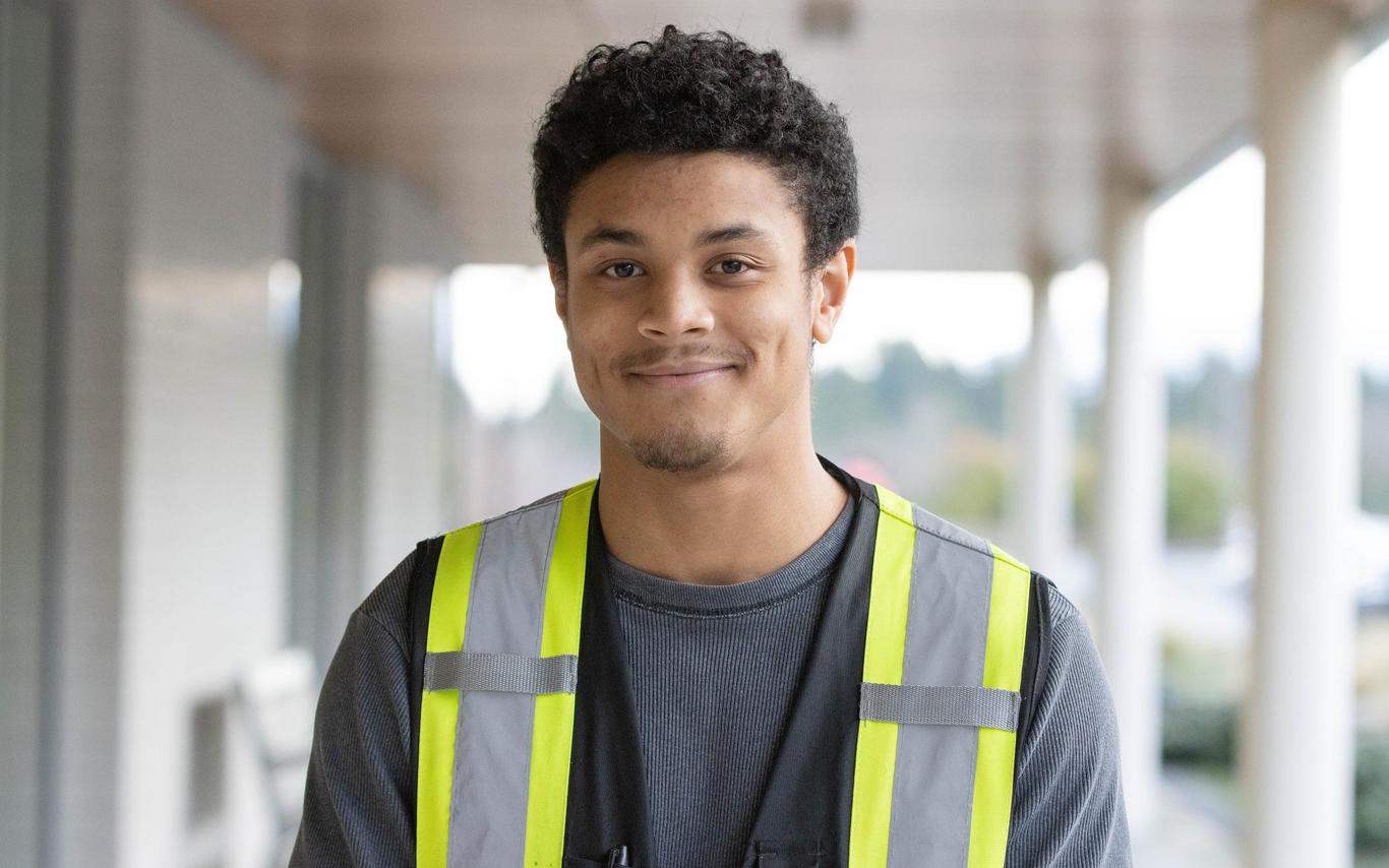 Mike de Vries portrait photo wearing an electrical vest